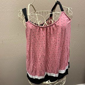 pink, white, and black sleeping wear set with dots